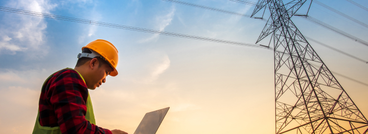 utility worker with power lines